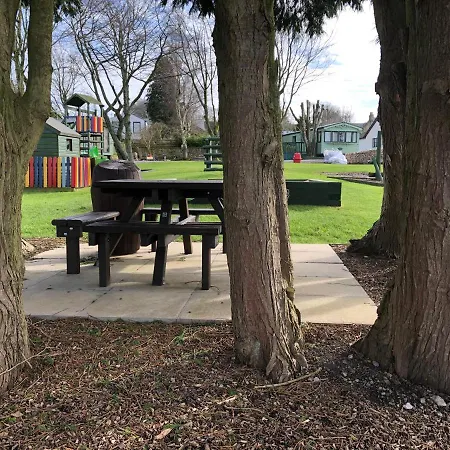 Delightful 2-bed Static Set In A Peaceful Village Holiday park *